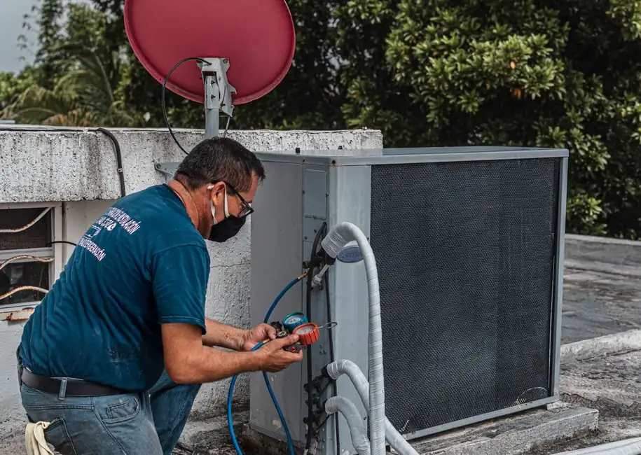 Technician using tools during a service visit